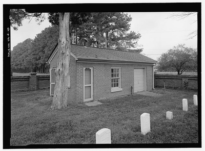 #ad 10. SERVICE BUILDING NORTH CORNER CEMETERY. VIEW NORTH. Cold Harbor National $9.99