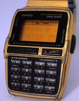 Casio DBC 300 Databank Timepiece Gold Vintage Rare CALCULATOR Illuminator