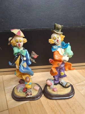two clown figurines