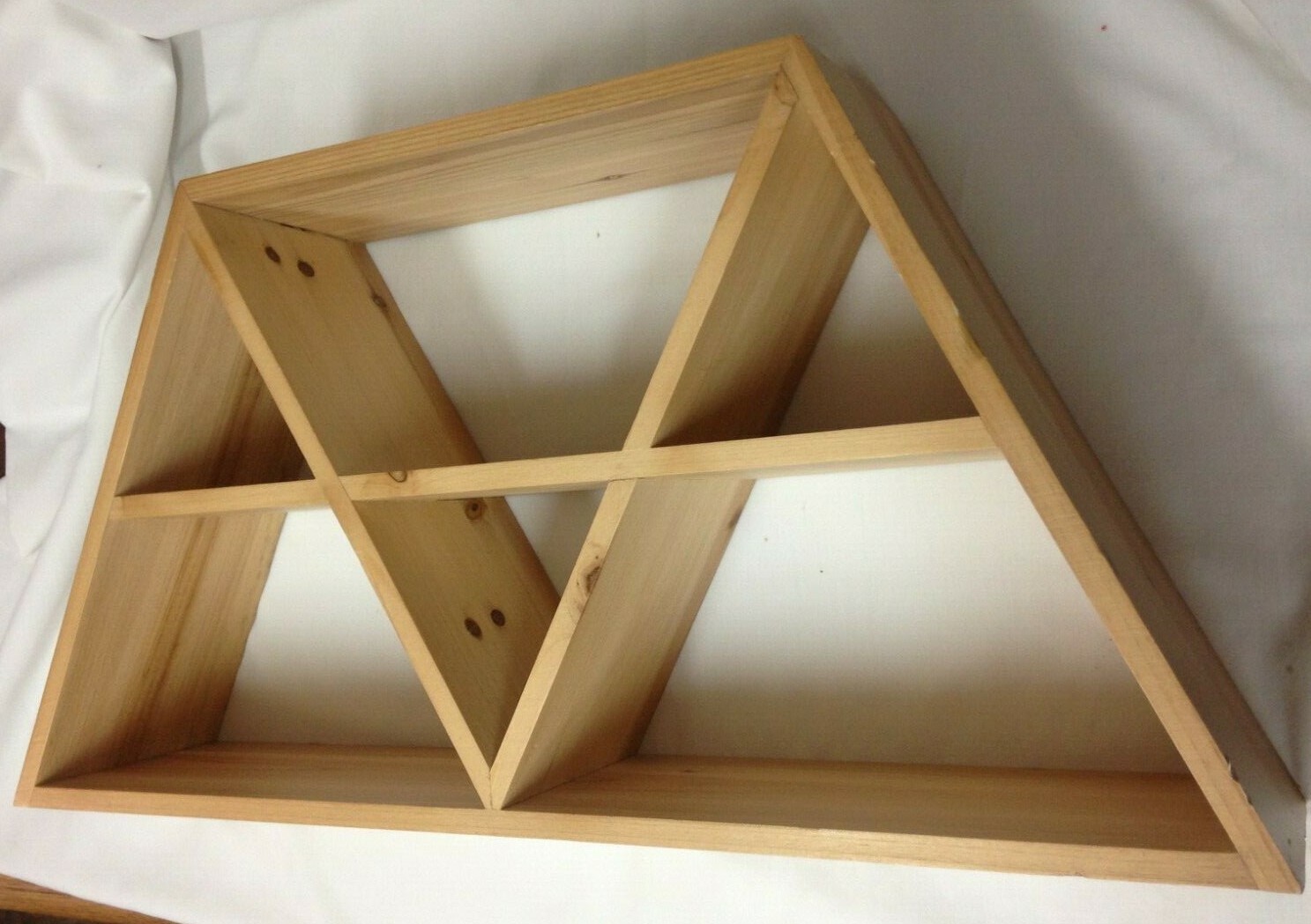 pillowfort triangle wall shelf