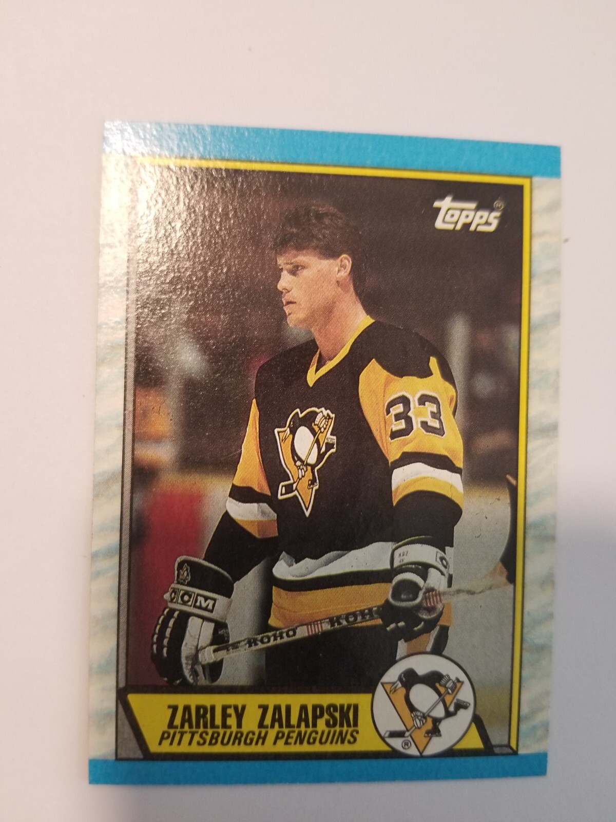 Zarley Zalapski #168 Hockey Cards 1989 Topps trading card — raw and PSA graded price guide