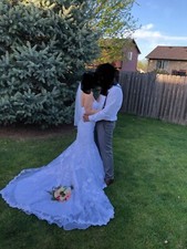 Davids Bridal Wedding Dress for petites. Color white. Size 2. I’m  5’1, & 110lbs