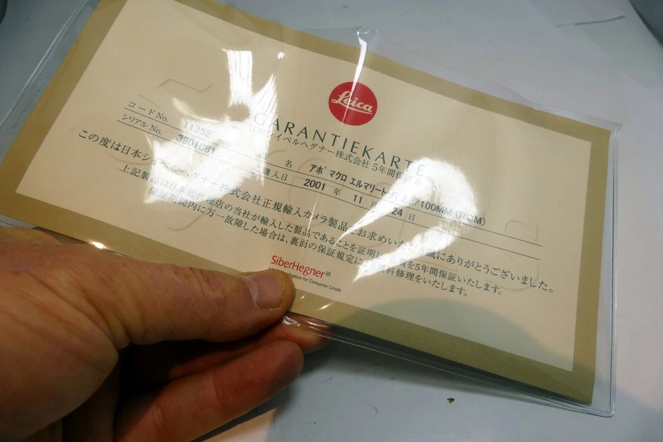 Tarjeta de garantía para lente Leica 100 mm f2,8 APO ROM Macro 11352 Foto 2 de 4