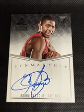 2014-15 Panini Paramount Penmanship Rookie Bruno Caboclo /99 On-Card Auto #PR-BC. rookie card picture