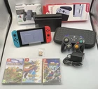 Nintendo Switch Neon Console Bundle Dock Case Controller 4 Games Pokémon Mario