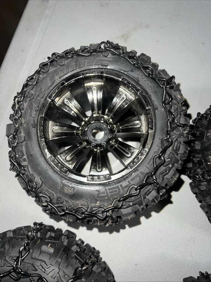 Proline Trencher 3.8" tires and rims. 17mm hex Black Chrome Rims W/ Chains RC - Image 4 of 4