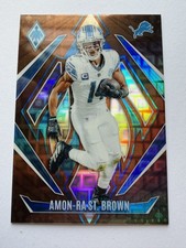 2024 Panini Phoenix - Amon-Ra St. Brown #8 Bronze Pandora /33