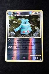 Bronzong 15/102 Triumphant Reverse Holo Rare