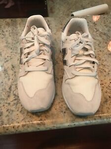 new balance 574 cream and rose gold trainers