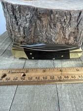 Buck Knives 110 Folding Hunter Knife With WEYERHAEUSER LOGO ON HANDLE NEW