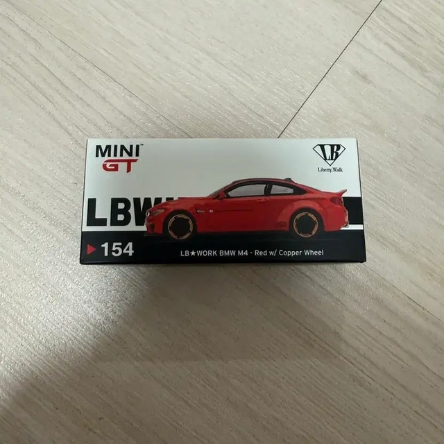 MINI GT LBWORK BMW M4 Model with Red Body and Copper Wheels - Pre-Owned