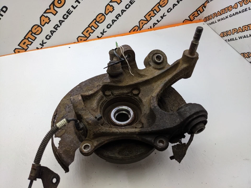 Hyundai Santa Fe MK2 2012 2,2 CRDI rueda trasera izquierda buje husillo Foto 2 de 4