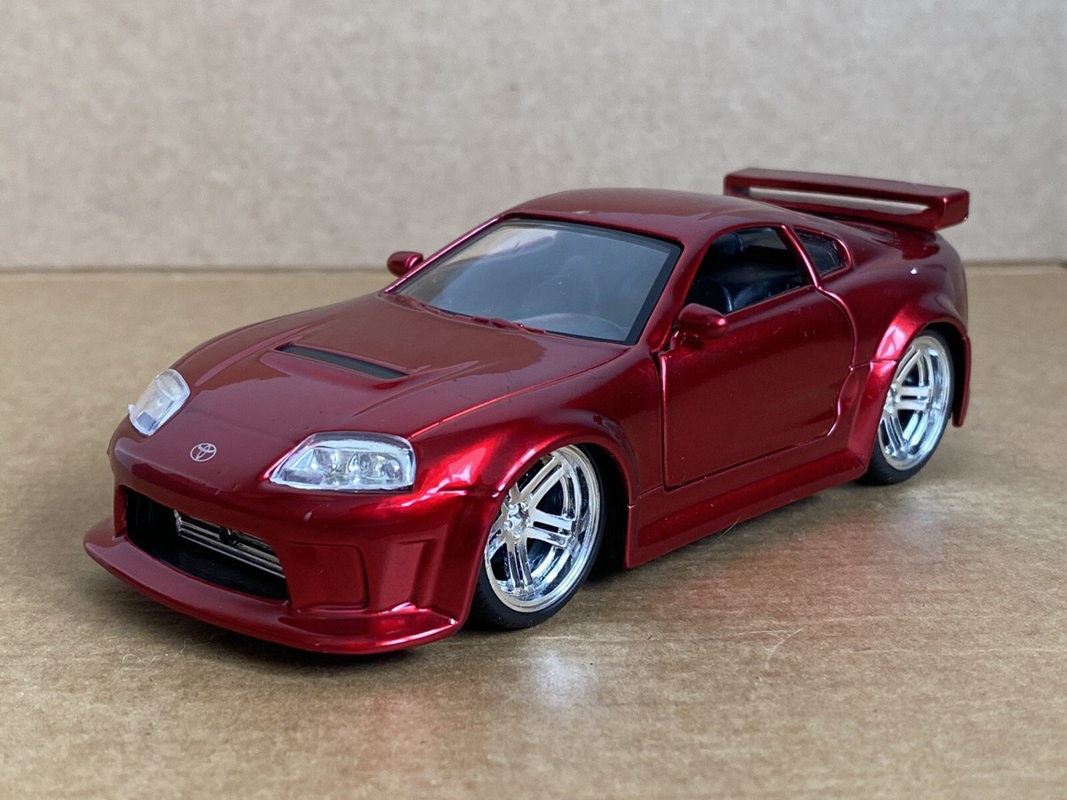 Jada Toys Dub City, 1997 Toyota Supra, 1:32 Scale, Chrome Red