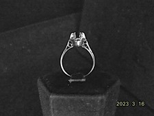 PLATINUM SOLITAIRE RING MOUNTING WITH ROUND OPENING FOR A STONE 5MM WIDE.