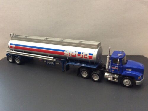 HO Herpa Mack Twin Screw Spur Oil W/ Eliptical Dual Axle Trailer