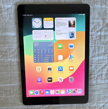 Apple iPad 6th Gen 128GB Silver 9.7in Wi-Fi Tablet MR732LL/A with a stylus