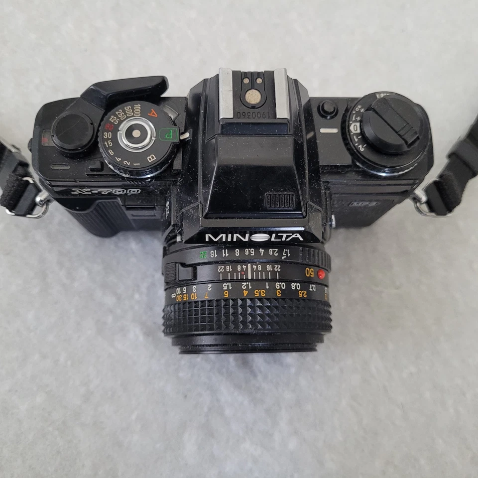 Cámara réflex de película Minolta X-700 35 mm con lente Minolta MD 50 mm, bucle original para el cuello Foto 3 de 4