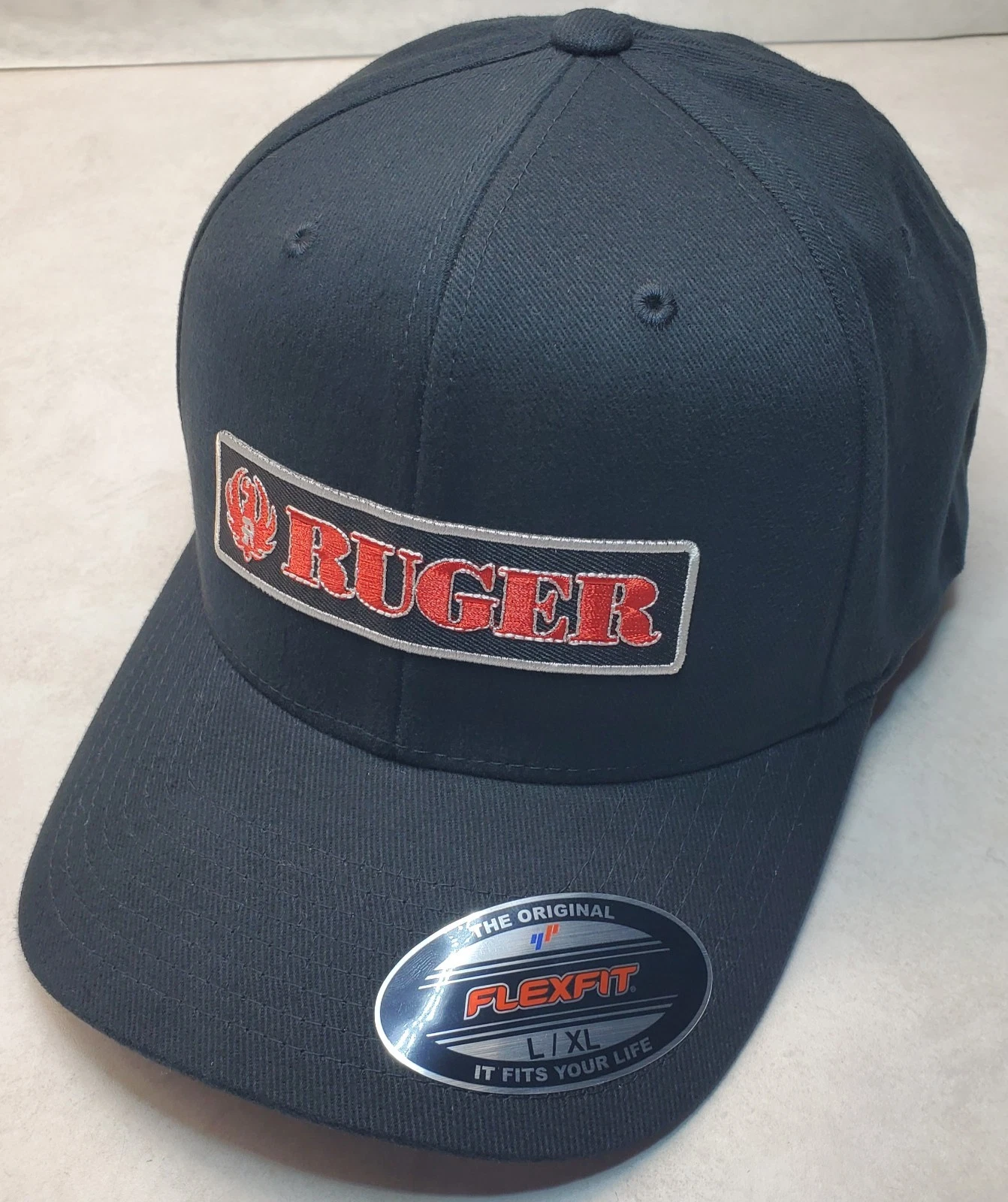 Ruger Firearms Embroidered Patch On Flexfit 6377 Black L/XL 7 1/4" - 7 5/8"