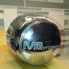 Mb Motoring Center Caps Like New. These As New Mb Motoring Center Caps