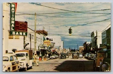 Vintage 1950s Second Avenue Fairbanks Alaska Postcard Kodachrome Cars Signs