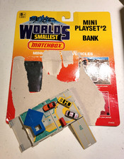 1990 Worlds Smallest Matchbox 2 Bank Playset COMPLETE w/card, 3 Cars  sign
