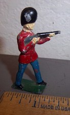 Vintage lead toy, hand painted soldier with rifle end broken off , fun item