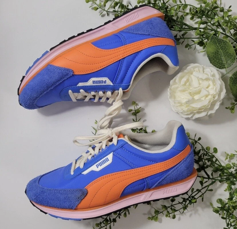 Puma blue top and orange sneakers
