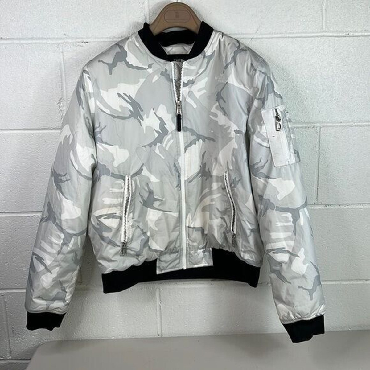 white camo north face