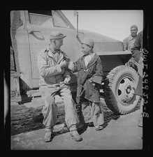 Photo:WWII Soldier Boy Truck Candid 1940s Military Photo