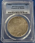 A 1922 P  Peace Silver Dollar PCGS AU Detail