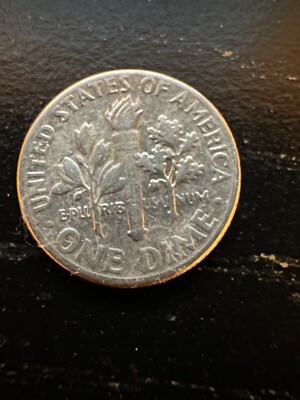 One dime 1974 D extra thickness and wide letter (one dime is