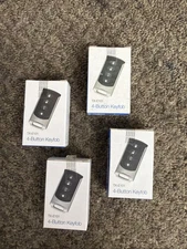 New Interlogix TX-E101 Four Button Chrome Wireless Keyfob LED