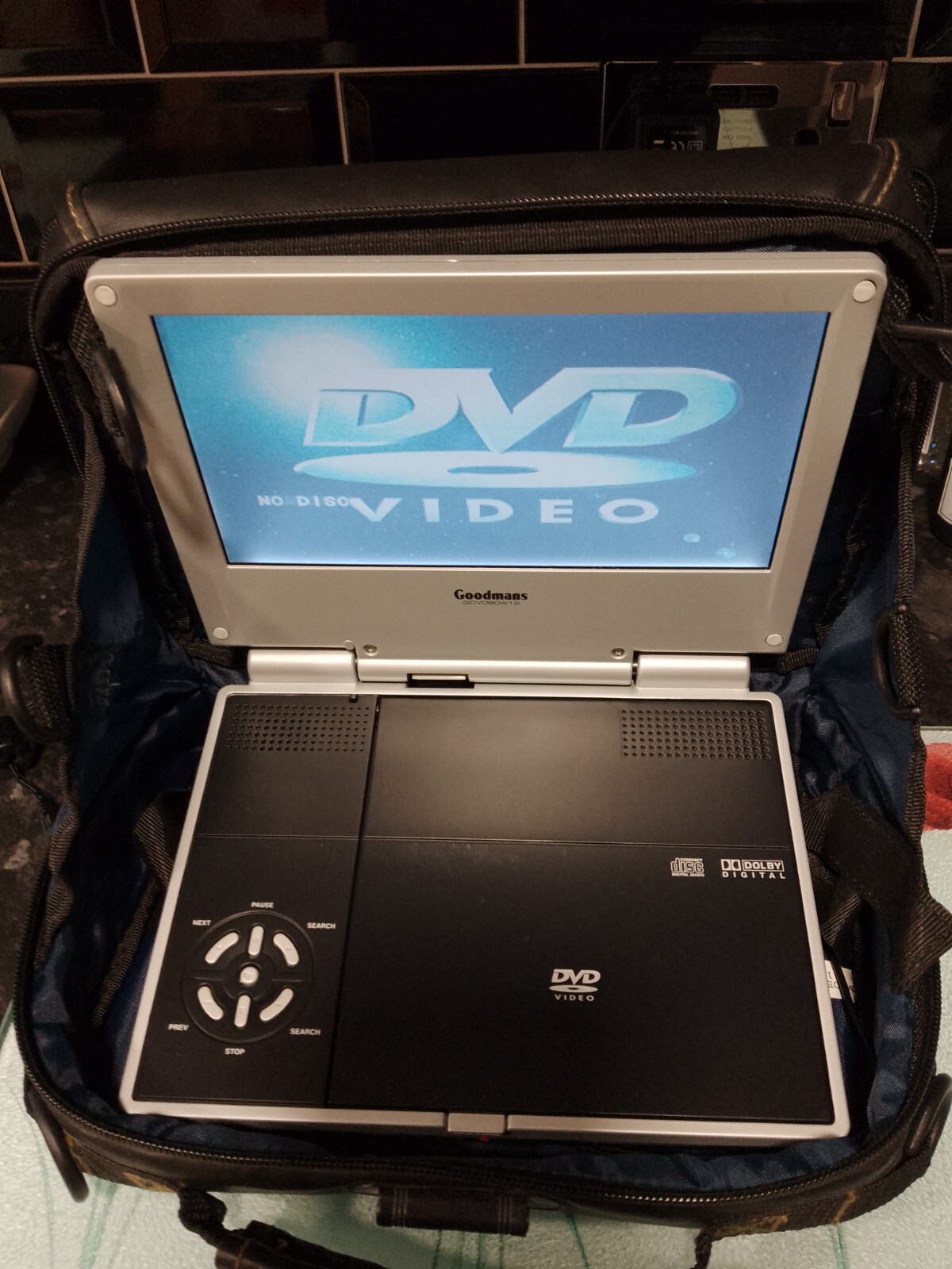 Goodmans portable DVD player and car/travel bag/holder, hardly used. eBay