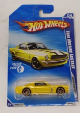 Hot Wheels 2010 FORD MUSTANG FASTBACK FASTER THEN EVER YELLOW FTE