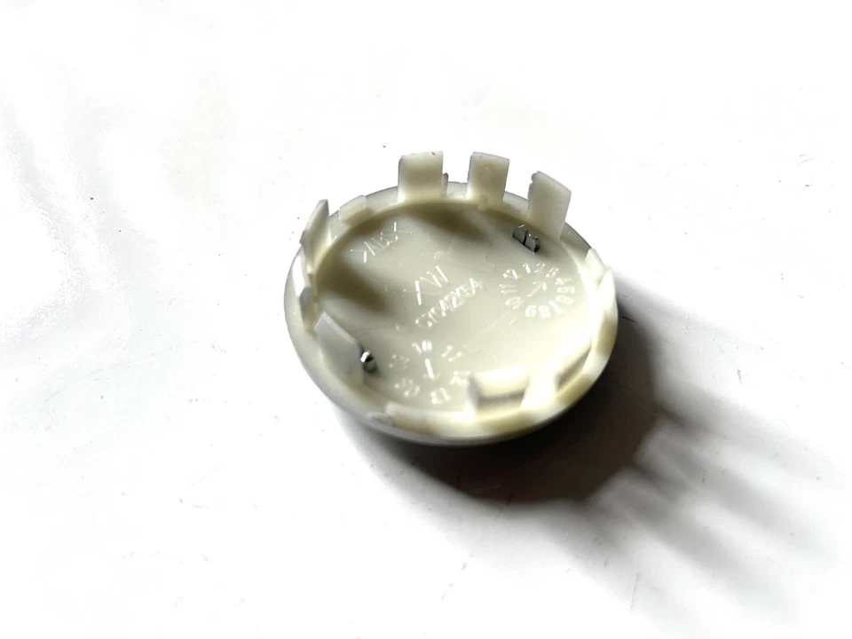 Tapa central llanta Nissan Rogue Leaf X-Trail Sentra Máxima 2002-2019 2-1/8" Foto 4 de 4