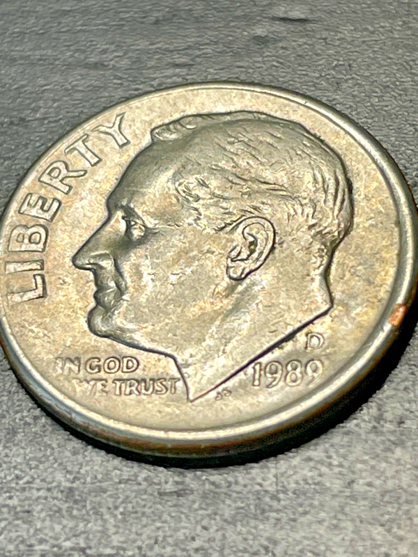 1989 D Roosevelt dime struck thru grease  IN We In We God We Trust