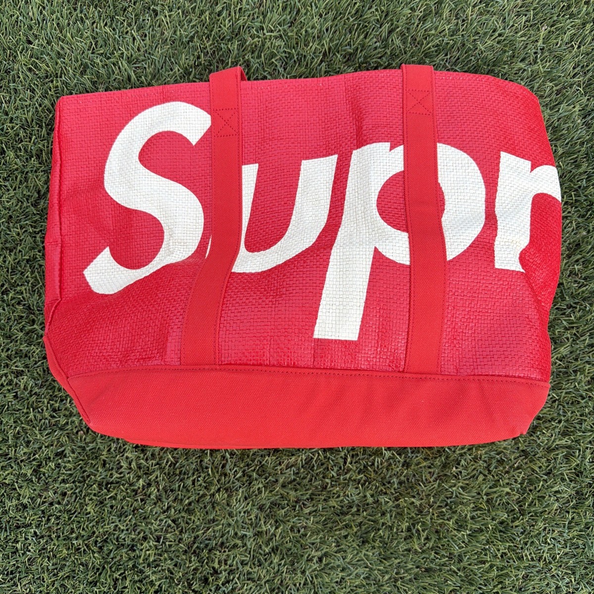 SUPREME raffia tote Red
