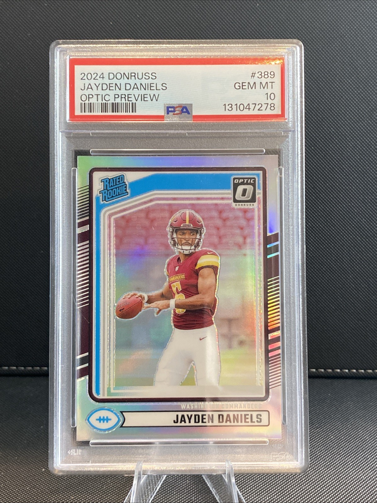 2024 Panini Donruss Optic Preview Jayden Daniels Holo Rated Rookie #389 PSA 10 view 1