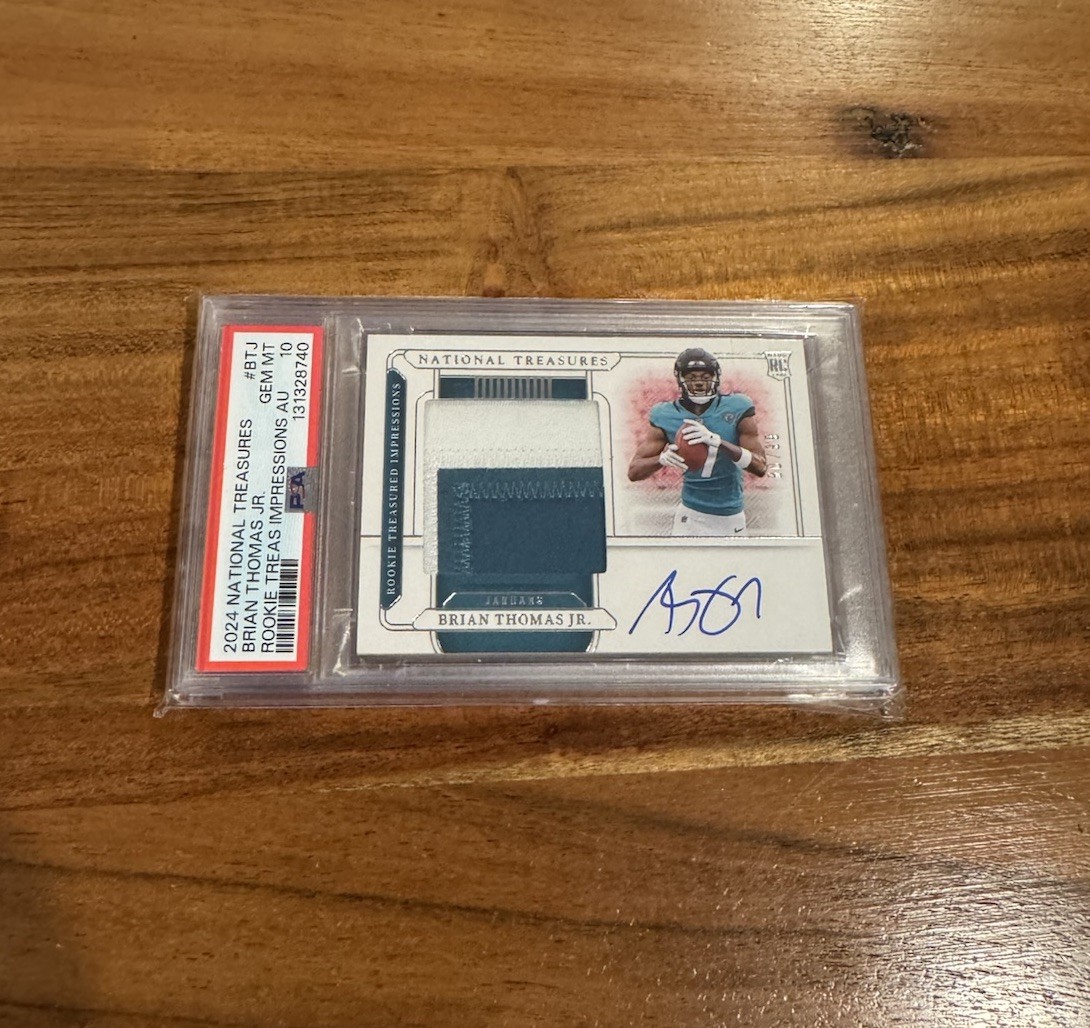 Brian Thomas Jr. 2024 Panini National Treasures /99 Rookie Patch Auto RC PSA 10