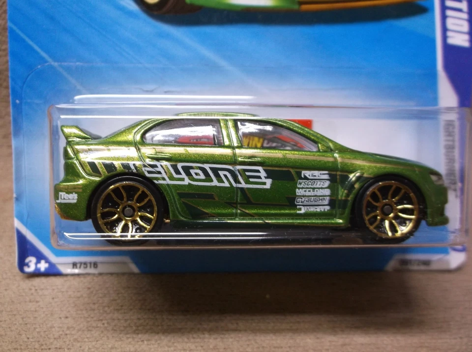 HOT WHEELS 2010 #91 GREEN 2008 MITSUBISHI LANCER EVOLUTION JDM KEYS TO SPEED - Image 2 of 3