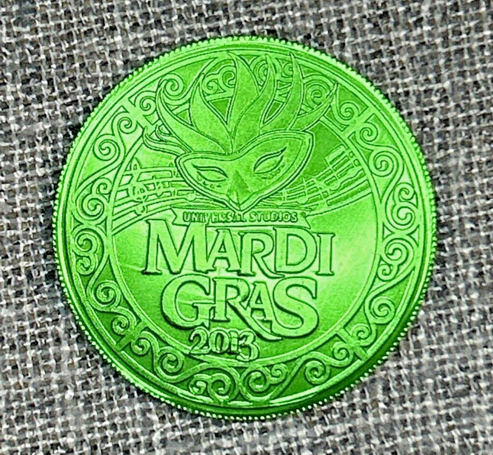 Universal Studios Florida 2013 Mardi Gras Green Medallion Throw Coin Souvenir