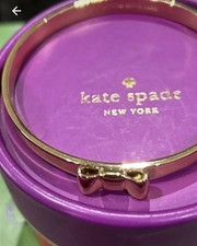 Kate Spade gold  Take A Bow Bangle In original box 
