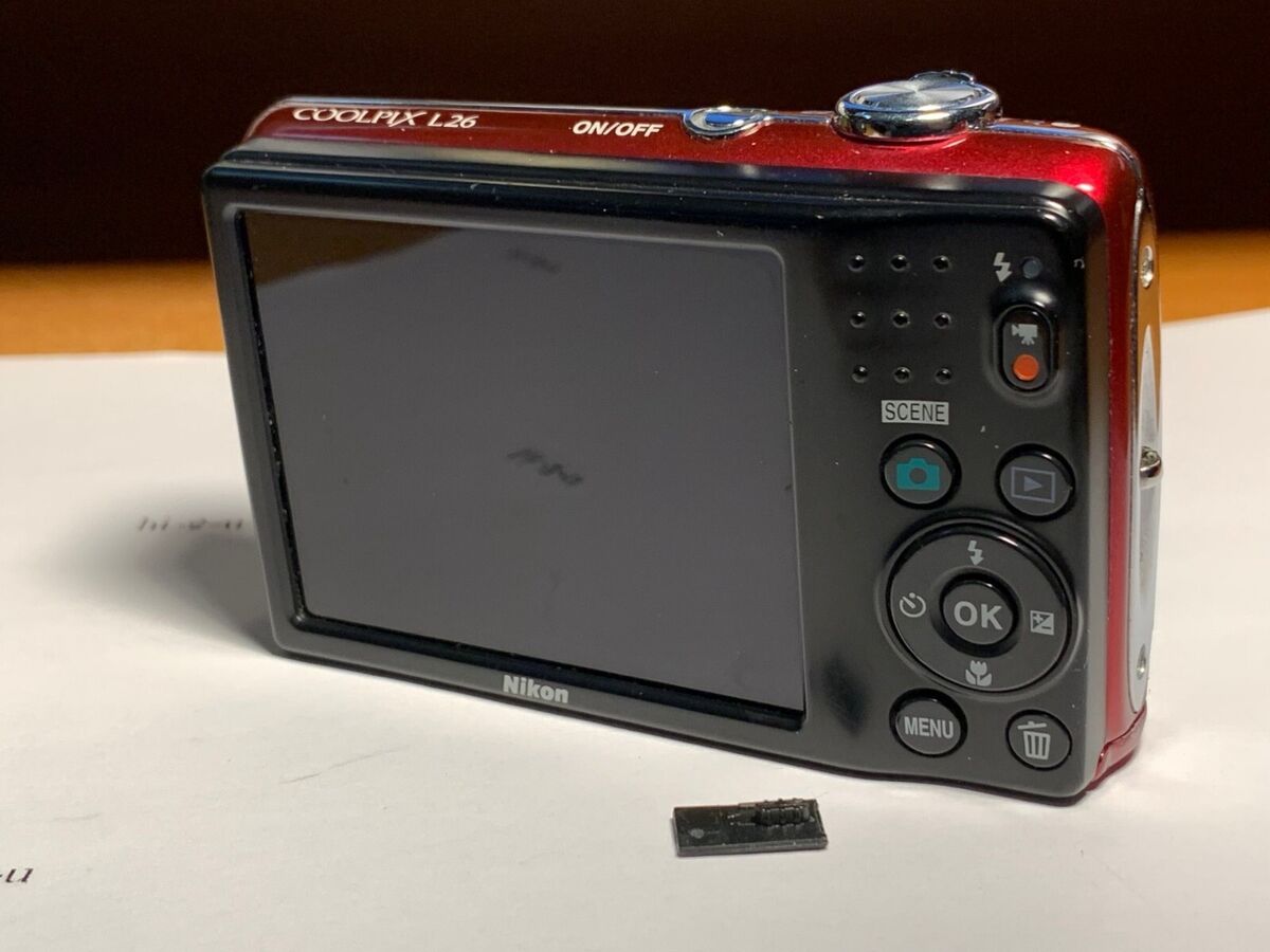 Nikon COOLPIX L26 16.1MP Digital Camera Lens + BATTERY DOOR Nikon COOLPIX L26 16.1MP Digital Camera Lens + BATTERY DOOR