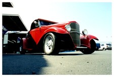 1934 Ford Roadster Red Convertible Low Angle Grille Chrome Vintage Photo
