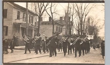 MARCHING BAND STREET PARADE real photo postcard rppc downtown music horns drums