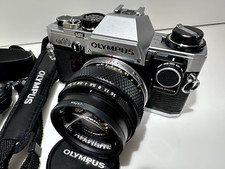 Olympus OM-10 body near MINT  G.Zuiko auto 50mm F1.4 lens near MINT 