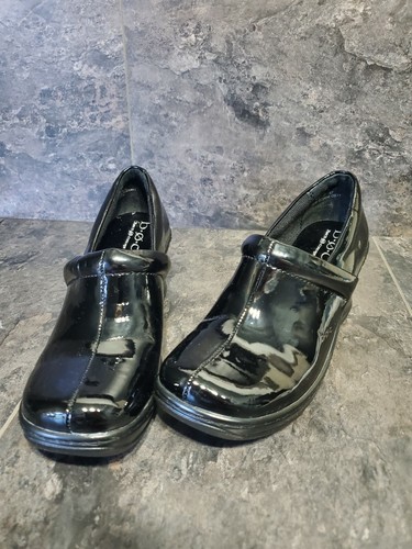 boc black patent leather clogs