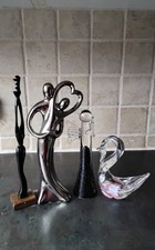 FOUR COLLECTABLE ORNAMENTS ( GLASS-CERAMIC-RESIN )