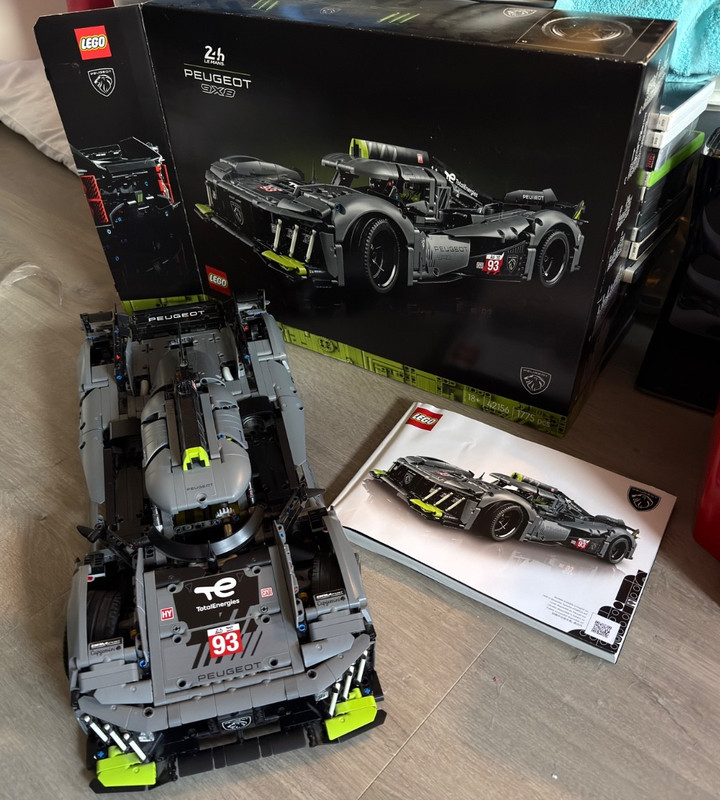 LEGO Technic Peugeot 9x8 24H le Mans Hybrid Hypercar (42156) with wall mount