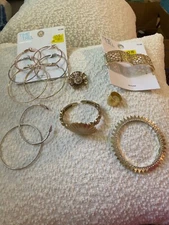 gold tone bracelets with gold arrow shell bracelet hoop earings ring and antiqu